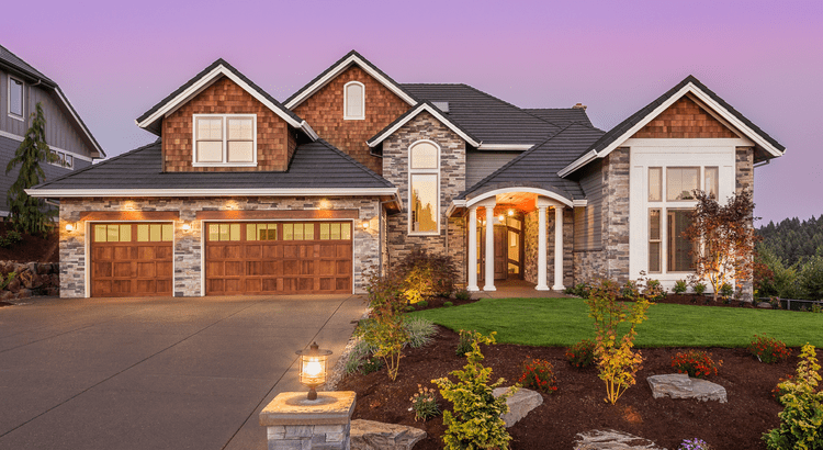 Luxury home exterior showcasing the high-end housing market
