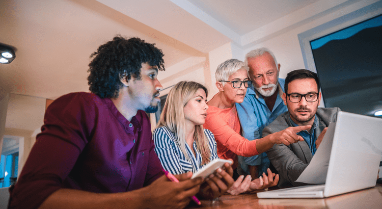 Couple reviewing finances while planning a move